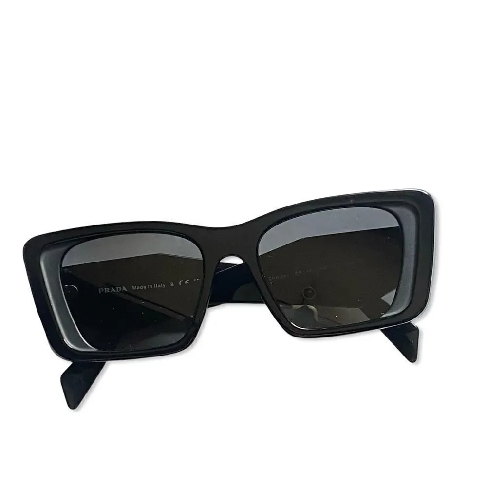 Prada Eyewear black square frame sunglasses logo sides Revolve in case $489